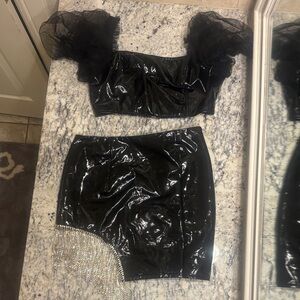 Black leather two piece with rhinestone fringe at side puffy sleeves crop top